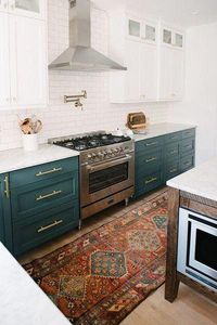 Love this beautiful tea color cabinet, and the brass handles add the just accent on it. #rugs