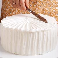 To make stripes while decorating a cake, start on the edges and run the side of a table knife to the center of the cake. Repeat until the whole top is covered. Using the same knife, make vertical stripes around the sides of the cake. --Taste of Home Test Kitchen