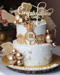 Celebrating in style with this royal-themed cake for a special occasion! 👑✨ The gold accents, custom initials, and elegant pearls bring sophistication to every detail. As a home baker, I strive to make each cake a work of art for your memorable moments. Alhamdulillah for every opportunity to create something this beautiful. 💛 Need a custom cake that adds a regal touch to your celebration? WhatsApp us on 7044955912 to make your vision come to life! 💌 #TheBakingMumma #LuxuryCakes #CustomCakeD...