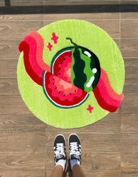 Add a splash of color and fun to your home with our Watermelon Tufted Rug! 🍉 This delightful rug is perfect for brightening up any room, whether it's your bathroom, bedroom, or living area. Handcrafted with meticulous attention to detail, each rug is a unique piece that brings warmth and style to your space. 🌈 ✶ Features: ✶ Hand Tufted with Care: Each rug is expertly crafted by skilled artisans, ensuring exceptional quality and durability.  ✶ Vibrant Watermelon Design: The playful watermelon m