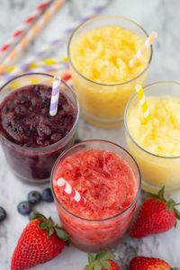 Keep your kids happy and hydrated this summer with simple real fruit slushies! These frosty treats are 100% free from artificial flavors and dyes, and sweetened with nothing but real fruit and a touch of honey.