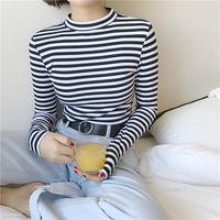 First rule of Stripe Club! Wear stripes. That's it. Super cute and simple long-sleeved turtle neck sweater top perfect with mom jeans!