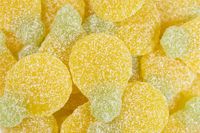 Pineapple-shaped gummies with sour pineapple flavor. Ingredients: Sugar, glucose syrup, glucose-fructose syrup, modified starch, dextrose, acids (E270, E296), acidity regulator (E350), flavoring, concentrate from (safflower, spirulina) Gelatin FreeGluten Free