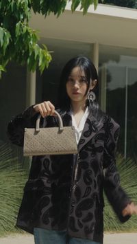 Yuqi, our brand ambassador for handbags and shoes with our new T Monogram Embossed Small Rectangular Tote