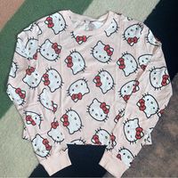 New Without Tags Sanrio Hello Kitty All Over Print Graphic Long Sleeve Tee. 100% Cotton. B-18” L-20”