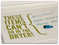 Use dry erase marker on washing machine to write what is in there you cannot dry