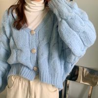 This soft baby blue knit cardigan has a cropped fit and button closures 💙 Free Size:Bust: 110cm/ 43.3 in, Length: 54cm/ 21.3 in, Sleeves: 67cm/ 26.4 inMaterial: Cotton, AcrylicFree shipping Worldwide