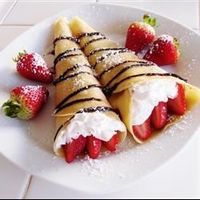 These traditional crepes are made with eggs, milk, flour, salt and oil.