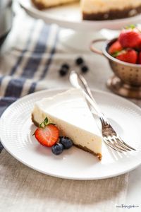 This Instant Pot Cheesecake is ultra soft and creamy and quick & easy to make! New York-style cheesecake that's baked in minutes in your electric pressure cooker! Recipe from thebusybaker.ca! #instantpotcheesecake #instantpot #baking #cheesecakerecipe #cheesecake #newyorkcheesecake #homemade #dessert