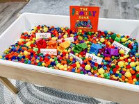 This rainbow pom-pom sensory bin... - Play to Learn Preschool | Facebook