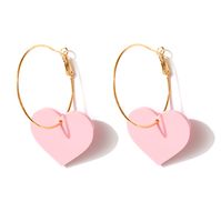 super cute lightweight gold coloured hoops with acrylic hearts 6.5cm long you will need to slide the hearts onto the hoops once you receive them!