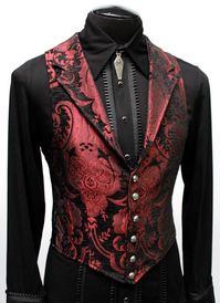 "A Victorian gentleman's vest with class. Great for formal occasions, can be worn under a suit jacket or by itself. Made in red and black tapestry fabric with black satin lining and back. This vest has a very flattering tapered fit and ties in back with satin beltings it can be made tighter in the waist. Fastens in front with six brass buttons. A notched collar adds extra style. Comes in sizes small-3X. (pictured with the empire tux shirt - sold separately) fabulous! Size small = chest 39\" wais