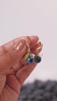 Adulting is hard, but making tiny blueberries is therapeutic..😌😉 Wanna know how to turn clay into crave-worthy blueberries? 🫐 Watch me whip up these tiny, tasty-looking treats! Perfect for jewelry or just ‘cause you’re obsessed with all things blue. Trust us, your inner child (and adult) will thank you! ✨ #clayearrings #polymerclayindia #polymerclay #handmade #blueberry #fruitearrings #smallbusiness (polymer clay, earrings, handmade, jewelry making,craft tutorial,earring tutorial, polym...