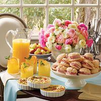 Lovely shower/brunch idea - fruit salad w/yogurt, gouda grits, tom-herb mini frittatas, biscuits, sparkling ginger-orange cock/mock-tails