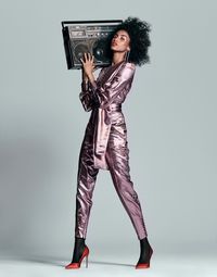 Imaan Hammam wears Hillier Bartley jumpsuit and Gianvito Rossi pumps