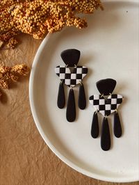 Black and white checkerboard dangles