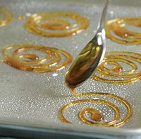 Basic Caramel: 1 cup granulated sugar +1/4 tsp. fresh lemon juice. The caramel will harden quickly upon cooling. Great for a garnish.