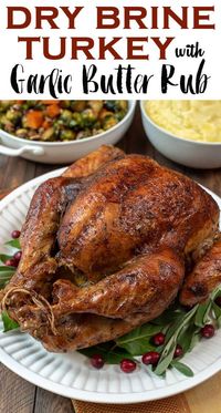 The process of dry brining creates this incredibly tender, juicy turkey with beautifully browned, crispy skin.  This Dry Brine Turkey with Garlic Butter Rub will make a gorgeous centerpiece for your holiday table. #drybrineturkey #drybrinerecipe #drybrine #turkey #roastturkey #thanksgivingrecipes