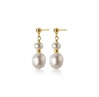 Double pearl drop stud earrings, on gold plated sterling silver posts. Dimensions 3cm long Please note freshwater pearls are imperfect pearls, each is unique.