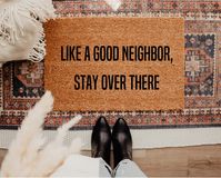 "Like a good neighbor stay over there doormat. Doormats are the perfect way to decorate your porch. They also make great gifts for Weddings, Housewarming, Birthdays, and more! **As seen on The Today show, Good Day LA, Buzzfeed, Real Housewives, and MORE A QUICK RUN-DOWN: Choose from either the flocking method or the UV printed doormats. For the **UV printed we use high quality cured UV Ink on the door mats to help prevent fading. The ink affixes directly to each fiber in the material. For the **