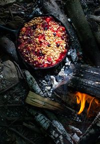 Part of the ultimate camping food day, get the recipe for this simple, seasonal berry crisp. Made in a cast iron pan over the campfire!