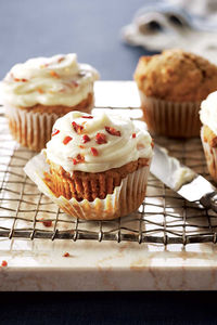 Pumpkin purée makes for a perfectly moist cupcake. And who can resist maple-bacon icing?