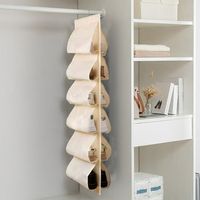 Hanging Shoe Organizer for Closet with 12 Large Pockets Roating Hanger for Storage Mens Shoes,Clothes,Also can used as Travel shoe rack hanging Feature: Quantity: 1Pcs Colour:Beige Material:polyester Product size:117x32cm/46.06x12.6in Package size:35x25x1cm/13.78x9.84x0.39in Net weight:180g/0.4lb Gross weight:180g/0.4lb Descrition: Large CapacityThis closet shoe file have 12 pockets,with larger openings for men's shoes. Each pocket can easily suit a pair of flats or sandals and you can put in tw