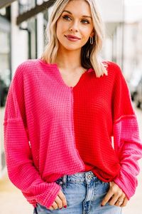 This sweater is always going to be a help when getting dresses in the morning! It's so cute and casual! The waffle knit fabric is so cozy and soft! We also really love those bright colors together! This sweater features long sleeves, a v-neck, colorblock print, and a waffle knit fabric.  Material has a generous amount of stretch.Cam is wearing the small.  Actual product colors may vary from images shown due to different viewing devices and lighting.