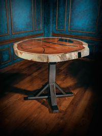 The Old West Live Edge Bar Table makes an exceptional addition to your western bar area.