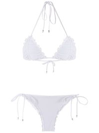 White ripple effect bikini set from Amir Slama featuring a triangle top, spaghetti straps, a back tie fastening, side tie fastenings, an elasticated trim, a stretch fit, a lining and fresh touch. This item is true to fit.