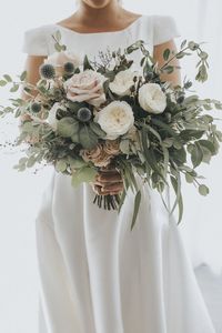 stunning blush greenery wedding bouquets with thistles