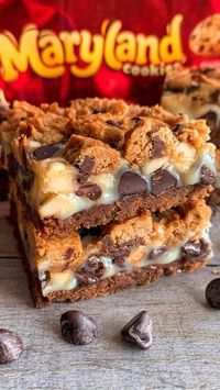 Fitwaffle Kitchen | Eloise on Instagram: "5-INGREDIENT CHOCOLATE CHIP COOKIE MAGIC BARS 😍 A buttery chocolate chip cookie base, topped with condensed milk, white chocolate chips, milk chocolate chips and more cookies! 🤤 There’re crunchy, sweet and chewy 🤌 Super easy to make, you pretty much just chuck everything in the pan and bake 👌 Sound on for full instructions 🔉 All you need is: 300g crunchy cookies, finely crushed + 15 cookies, broken 110g unsalted butter, melted 1 tin (397g) condensed