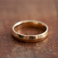 Our contemporary knife edge band is a modern and unique take on the classic wedding band. This style turns a simple band into a gorgeous statement. Handmade in our Vermont studio using recycled gold, you can be sure this symbol of your love is made with love. Band and Width: Shown here in a 4mm width. Knife-edge profile. Metal: Pictured in 14K yellow gold.Sourcing note: We use 100% recycled metals refined in the USA as well as ethical, sustainably-sourced Fairmined gold. Any of our designs can a