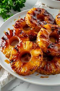 The next time you get a sweet craving, try this fantastic grilled pineapple. Serve it with a scoop of ice cream, and you'll want to lick the bowl clean!