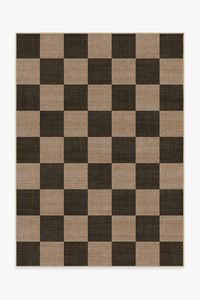 A classic pattern that’s sure to turn heads every time. Our Checkerboard Soft Black Re-Jute Rug features a bold geometric pattern in weathered black on a warm beige background that gives off the regal ambience of vintage Italian flooring. The woven jute-like material is made from recycled and virgin polyester, and polyurethane that won't shed or fray. Water-resistant, stain-resistant, and machine-washable. | 150 cm x 215 cm | Machine Washable Runner Rug | Kid & Pet Friendly | Indoor Rug | Checke