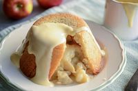 Britain is known for tasty puddings like apple Charlotte. Buttered and baked bread is filled with apples, then covered in custard sauce in this classic dessert.