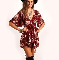 Stay bo-ho this summer with this beautiful flowing half sleeve floral short romper playsuit