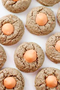 Treat yourself to a favorite spring flavor with these Carrot Cake Blossom Cookies! Carrot Cake flavored cookies with Carrot Cake flavored KISSES!!