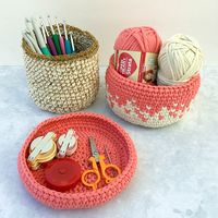 Use Red Heart Strata Yarn or Bernat Maker Home Dec to make a set of these modern nesting baskets. This pattern is a perfect, fast organizing project. Or fill it with a candle or baby essentials to turn this into a fabulous, functional gift basket. Perfect for housewarming or baby gifts!