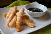 Lemon Churros with Blueberry Sauce