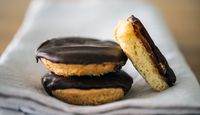 Traditional chocolate-glazed, orange jelly-filled British Jaffa cakes are surprisingly easy to make at home!