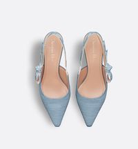 The J'Adior slingback pump is a prime example of Dior's savoir-faire. Crafted with passion in Christian Dior's Italian ateliers, the silhouette is distinguished by pastel blue embroidered cotton. The J'Adior two-tone embroidered ribbon is embellished with a flat bow, and a 6.5-cm (2.5) comma heel offers an elegant and refined finishing touch.. 35.5