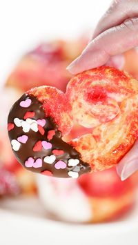 These easy Puff Pastry Cookies are heart-shaped Palmiers with red sugar dipped in chocolate and topped with sprinkles for Valentine’s Day!