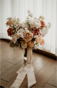 Late Summer Wedding Bouquet, Terracotta Rose, Ranunculus, Toffee Rose bridal bouquet, wedding bouquet, elora mill wedding planner Laura Olsen Events, Jeff Shuh Photography and Guelph wedding florist, Forever Wildfield