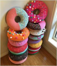 Here's how to make your own Crochet Donut pillow - multiple free patterns and a video tutorial, they're so easy and completely awesome! here's a step by