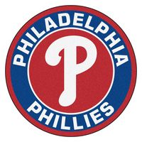 MLB - Philadelphia Phillies Roundel Mat 27" diameter Roundel Mats from Sports Licensing Solutions are the perfect addition to any room. With a 27 inch diameter, these mats are perfect for Bedrooms, Game Rooms, and Laundry Rooms. The Mat features your favorite teams logo in the center with a ring that state the teamÕs name. The vibrant colors are printed onto 9oz nylon carpet making the roundel soft to the touch. We designed these mats to last for years, to the backing is vinyl and the edges are