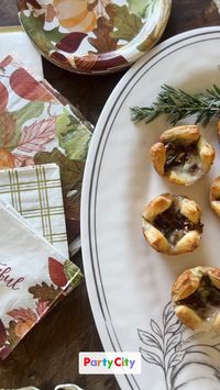 Here’s an easy Thanksgiving appetizer to set out before the big fall dinner. 

Cranberry Pecan Brie Bites Ingredients:
- 1 sheet of puff pastry, thawed
- 8 ounces Brie cheese, cut into small cubes
- 1/4 cup cranberry sauce (homemade or store-bought)
- 1/4 cup chopped pecans
- 1 tablespoon fresh rosemary, chopped
- 1 tablespoon honey (optional)
- Flour, for dusting

Find the perfect Thanksgiving or Friendsgiving aesthetic with Party City!