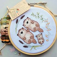 Cross Stitch Pattern - Otter Love, contains pattern and instructions on how to make both 3 otter and 4 otter options! by LittleBeachHut on Etsy https://www.etsy.com/uk/listing/272829978/cross-stitch-pattern-otter-love-contains