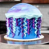 11. Blue Ombre Ruffle Cake When you start planning any party, you want to be creative—whether it is your decoration, dress, dessert or a cake idea. You will want the party pleasurable for everyone.