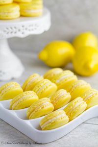 Lemon French Macarons- perfect spring-flavored confections with zesty lemon buttercream that you can make right at home with my new video tutorial!